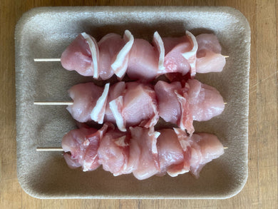 Chicken breast and dry cured back bacon skewer
